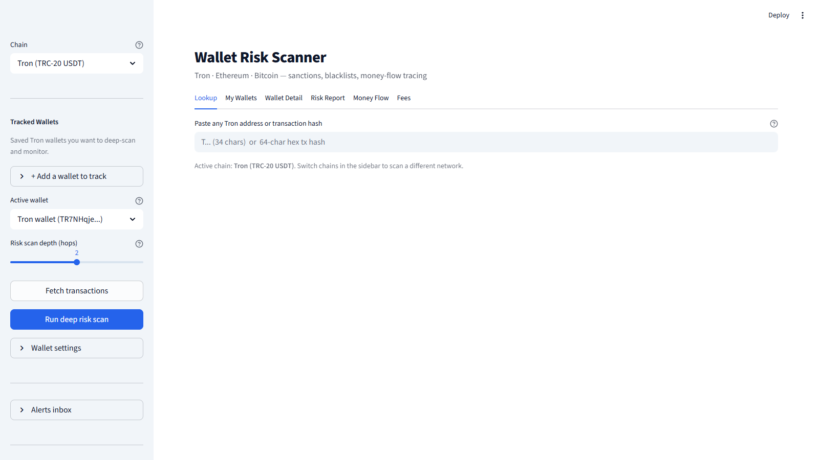 Wallet Risk Scanner Streamlit dashboard — chain selector and tracked-wallet sidebar on the left, multi-tab verdict UI (Lookup, My Wallets, Wallet Detail, Risk Report, Money Flow, Fees) on the right. Fresh-load empty state.